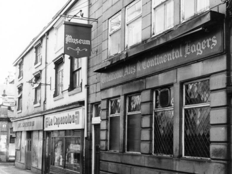 Orchard Street, Sheffield city centre, in 1986, showing the Museum pub, La Capannina restaurant, and the former Sheffield Raincoat Stores