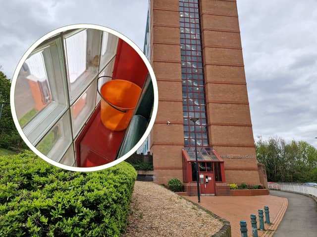 Harold Lambert Court in Sheffield, where buckets have been placed in the stairwell to catch water coming in when it rains. Together Housing has responded to complaints about the condition of the tower block
