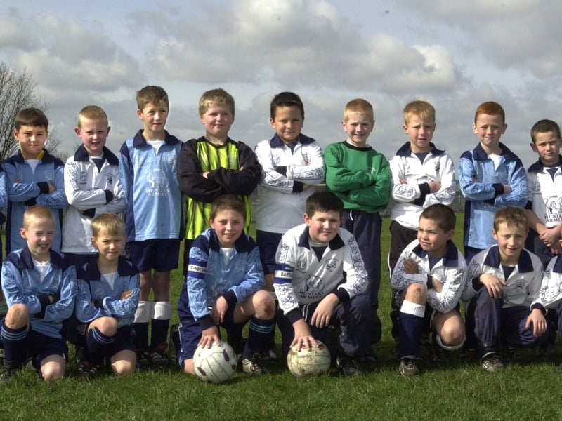 Wortley Boys U-9s football squad in April 2001. Pictured c centre holding footballs are joint captains, Angelo Concrino, left, and Grant Morris.