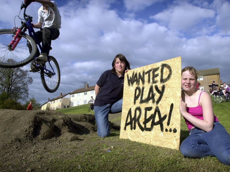 Children on the Heights estate launched a campaign for a BMX dirt track in April 2002. Pictured is Matthew Johnstone flying high over Louisa Johnstone, left, and Lauren Adams.