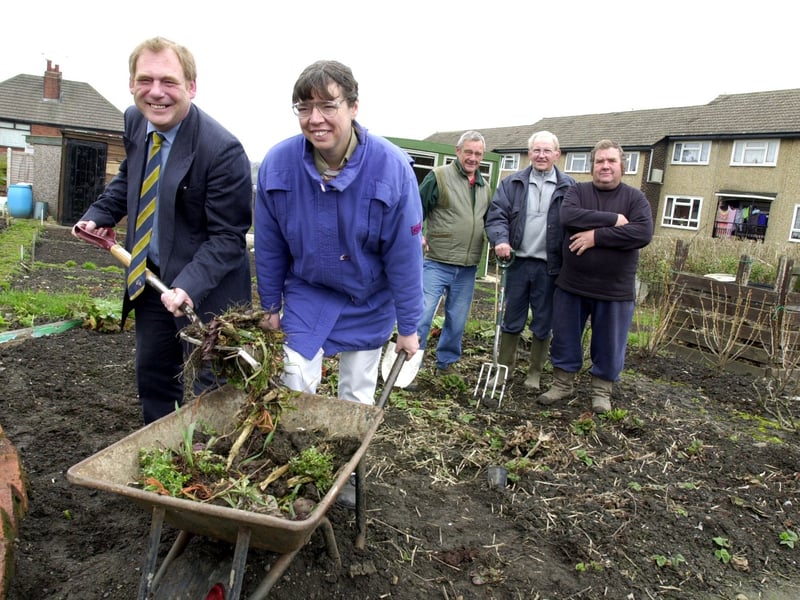 Councillors David Blackburn and Claire Nash help out at the New Wortley Allotments in April 2001 after donating money for a new office at the site. Watching on are committee members Len Capstick, Gordon Metcalfe and Bill Walsh.
