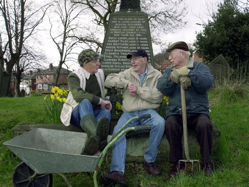 Norman Spencer, Frank Cave and Sydney Rawling who tend the graveyard at St John the Evangelist Church. Pictured in March 2002.