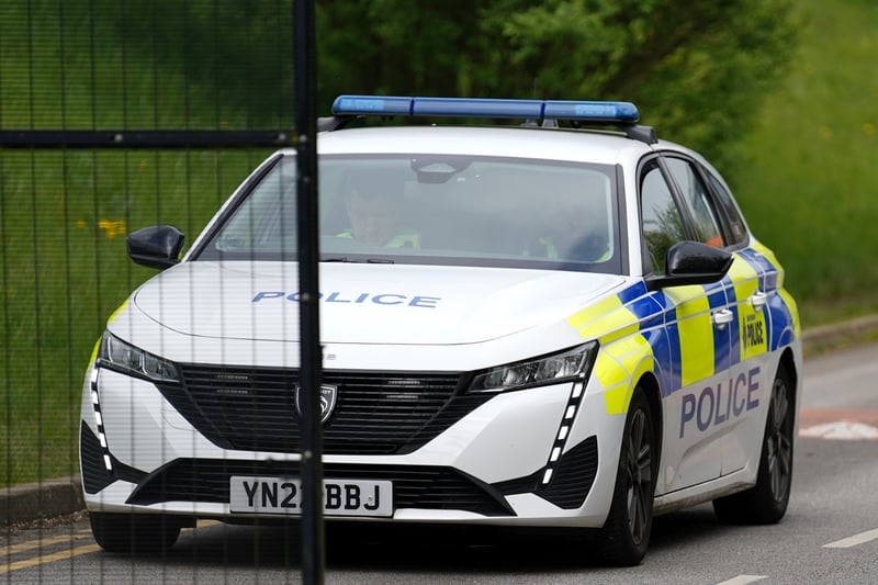 Police officers guarded the school gates as pupils were evacuated out the building