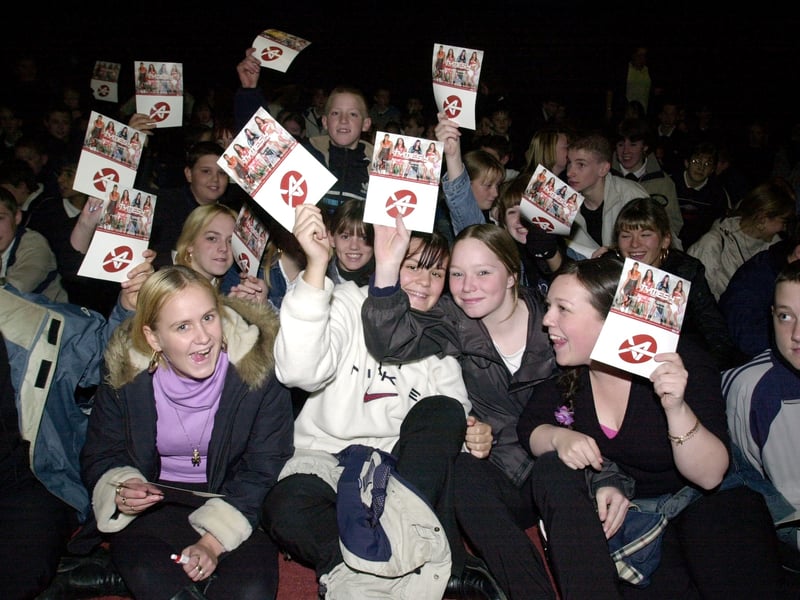 Pupils watch the new girl band Tymes 4 perform in November 2001.