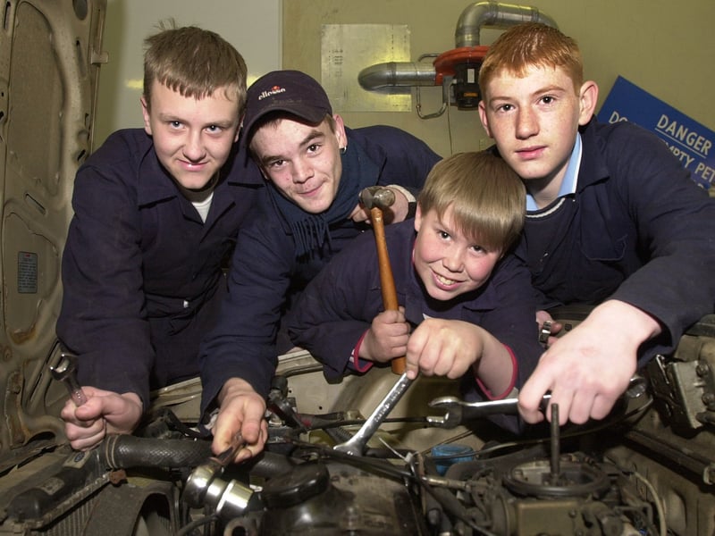 These pupils were doing a motor mechanic course at West Leeds Family Learning Centre in March 2001. Pictured, from left, are Lee Carpenter, Carl Woollin, Gareth Hudson and Lee Revell.