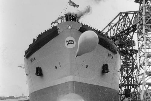 Balloons, bagpipes and bubbly made the launch of Mexican carrier Mitla one of the most colourful.
The 1985 event left the VIP guests and the press photographers drenched in champagne when the bottle was smashed over the bows.