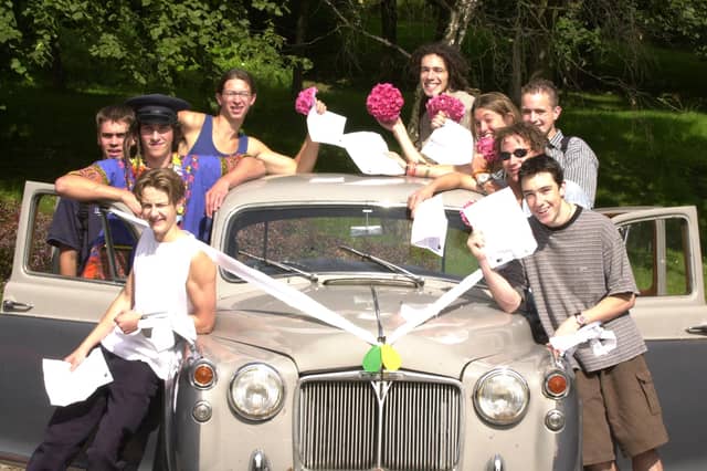 A-level students from Tapton School got dressed up for the day and dressed this Rover 90 car up for the occassion. It was driven by Andrutsio Harvarelli, left.