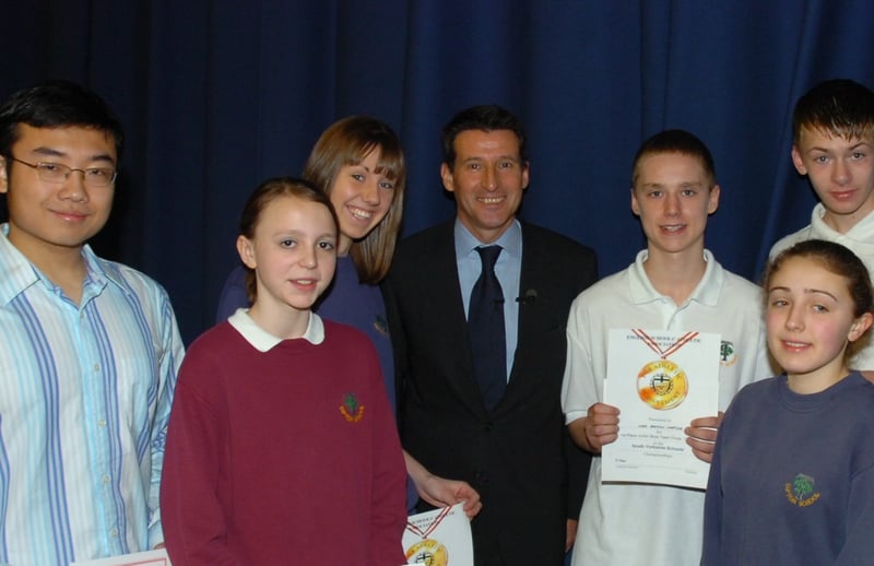 Lord Coe presents awards to Tapton School pupils who will be in the National Cross Country championships. Pictured from left are Mike Geo, Laurel Quinn, Kelly Hewitson, Seb Coe, Chris Grayson, Hazel Stubbs, James Gray and headteacher David Bowes