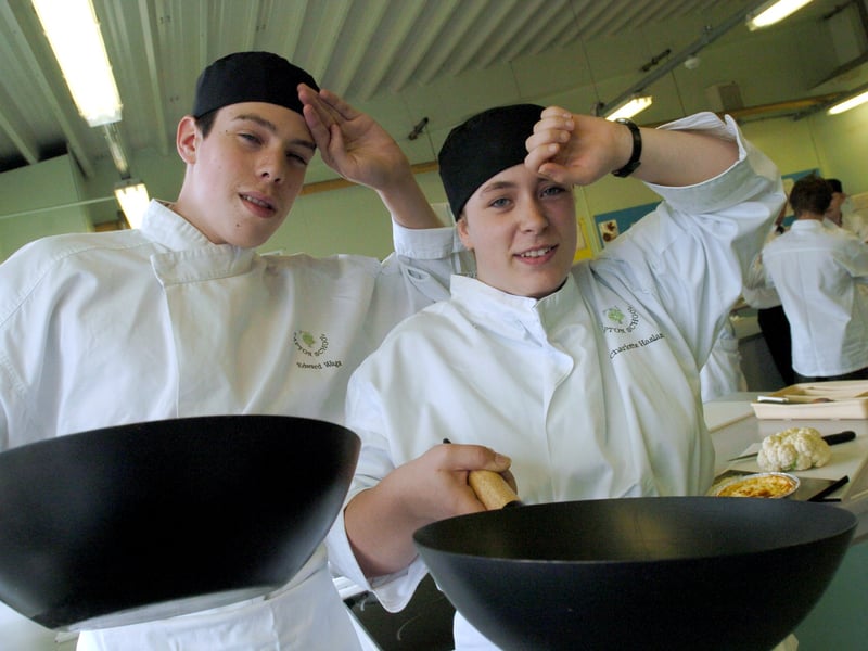 Year 10 pupils Edward Waga and Charlotte Haslam cooking in the technology room at Tapton School, Sheffield, in June 2006