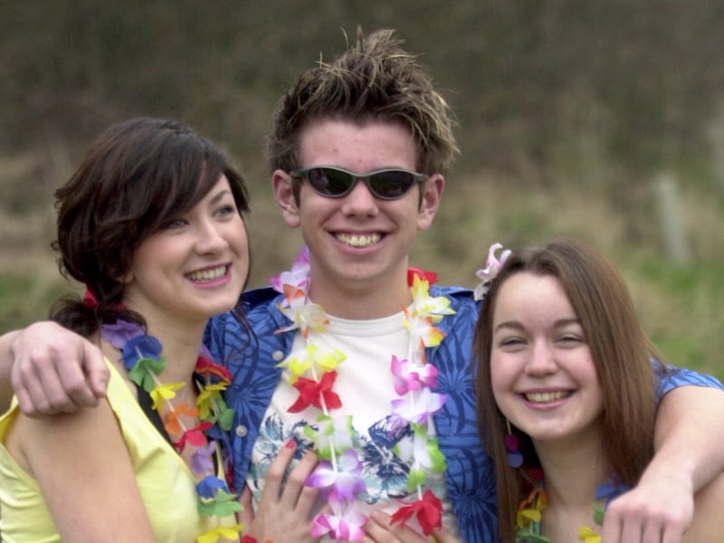 Sixth formers dressed as Hawaiians and pirates during their charity week at Tapton School in April 2004. Pictured left to right are Helena Betts (17), Paul Mitchell (19) and Charlotte Musgrove (16)