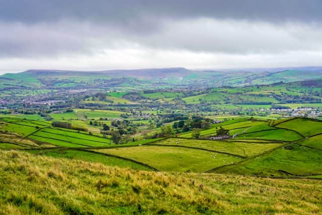 The Peak District, with acres of rolling green countryside.