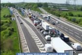 Heavy congestion was captured on CCTV on the M1 between junction 33 and 34 northbound today (May 2) following a collision between a car and a lorry.