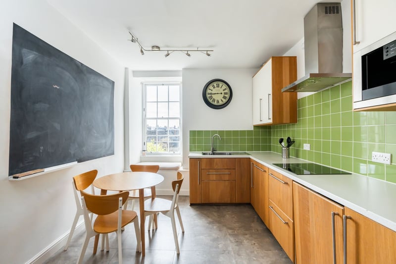 The kitchen/dining room is positioned to the rear of the building and has a window seat with charming roof top views to the west. The kitchen is fitted with a good range of modern wall and base units with integrated appliances including a coffee machine, fridge freezer, Bosch dishwasher, Zanussi washing machine, oven, induction hob and cooker hood.