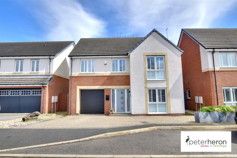 This modern four bedroom home has been brought to the market by Peter Heron for an asking price of £499,950.