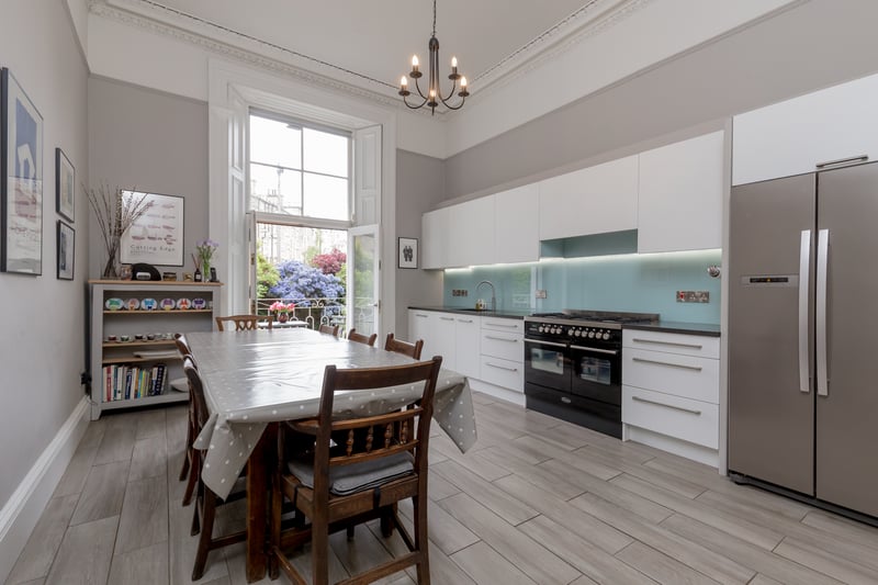 Interior: The apartment’s ground floor comprises a large bay-windowed formal lounge, a contemporary kitchen with balcony and a study/fifth bedroom. Downstairs are the remaining double bedrooms and a sizeable family room.