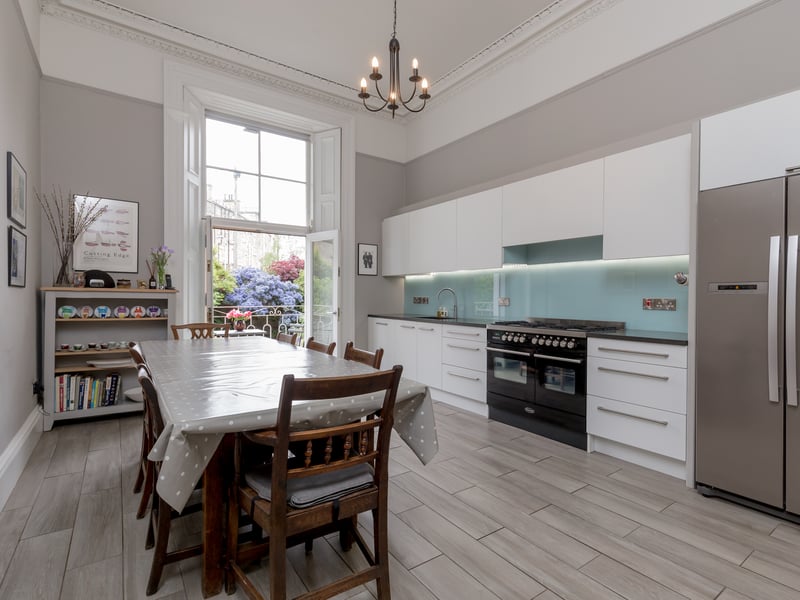 Interior: The apartment’s ground floor comprises a large bay-windowed formal lounge, a contemporary kitchen with balcony and a study/fifth bedroom. Downstairs are the remaining double bedrooms and a sizeable family room.