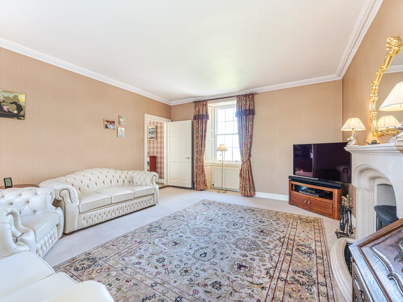 The accommodation is set over three storeys with the ground floor giving way to a good-sized drawing room lit by a large bay window, a formal dining room with attractive Palladian arched glazing, and an open-plan kitchen with family area leading to a snug and office.