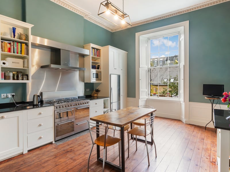 Interior: A ground-floor hall leads to a lounge and drawing room, which are connected by double doors. The apartment’s modern kitchen has a range-style cooker, and there is a formal dining room. Its four bedrooms are all on the lower-ground level, above a home cinema and music room.