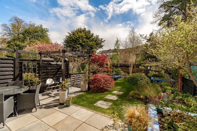 The delightful landscaped garden, which is level and fully enclosed, is directly south facing and features a manicured lawn, paved seating area, raised beds, mature trees and garden shed. Unrestricted on-street parking is available.