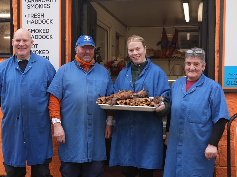 (From left to right) Colin Mudie, Campbell Scott, Lauren Angus and Elaine Green showed me around Abroath Fisheries where they make the famous smokies. I saw the process from start to finish with Campbell preparing the fresh Haddock delivered on a ferry from Shetland before they are tied in pairs at the tails over a beam to then dangle over a fire in a barrel and smoked. The soft, white fish turns a coppery colour on the outside as the flesh develops a melt-in-your mouth buttery flavour with a hint of smoke. It's no surprise there is a resident seagull, Elvis, who sits patiently on a nearby rooftop waiting for any scraps to be thrown his way.
https://www.scotsman.com/hays-way/hays-way-two-smokies-swinging-from-my-rucksack-a-perfect-snack-and-social-deterrent-4571847