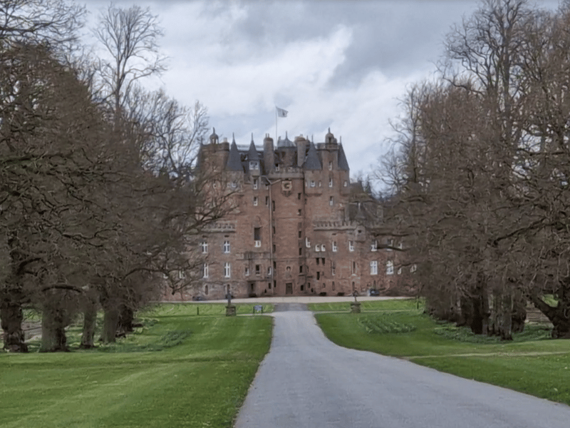 A screenshot from a video I took of Glamis Castle during a drive around with Kay Adams, who farms with her family at nearby Newhouse of Glamis, Forfar, which I went to visit on Hay's Way. The castle was childhood residence of HM Queen Elizabeth The Queen Mother, and is now home to her great-great nephew Simon Bowes-Lyon, the Earl of Strathmore. The building is open to the public and has a string of ghost stories, including one about the ghost of the woman with no tongue. She has reportedly been seen wandering around the grounds pointing to her badly wounded face. One of my favourite tales about the fairy tale castle though is how attempts to build it initially on nearby Hunter’s Hill were thwarted by the “little people.” Legend has it Hunter’s Hill was their special place and, each night, after the builders had finished, these "little people" would sneak up to the site and dismantle the stones so that there was no trace of the building work left by the following morning. This went on for some time until the builders took the hint, and moved to build Glamis on its present site.