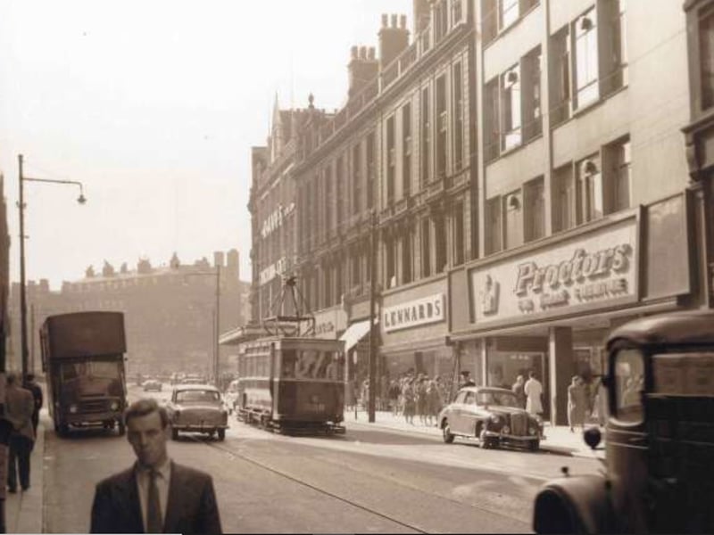 Fargate, Sheffield city centre, some time between 1960 and 1979, showing Lennards shoe shop and Proctors house furnishers