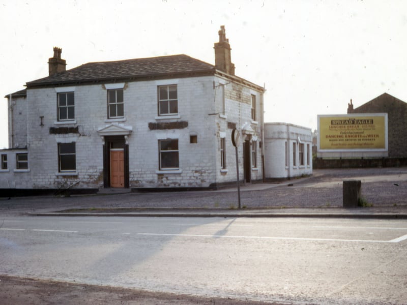 The Spread Eagle pub at Gildersome Crossroads, taken in Jun e 1968 just prior to its demolition. The crossroads were to be reconstructed at the time to facilitate the building of the M62 in the vicinity. A large hoarding for the pub is still up advertising dancing six nights a week.