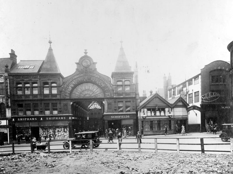 A photograph of June 1930 which shows Schofields on either side of the Cock and Bottle, but before the store took over the whole of Victoria Arcade. The L-shaped arcade was designed in 1898 by Thomas Ambler and named to celebrate Queen Victoria's Diamond Jubilee; it connected Upperhead Row with Lands Lane.