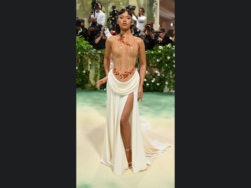 Taylor Russell attends The 2024 Met Gala Celebrating "Sleeping Beauties: Reawakening Fashion".