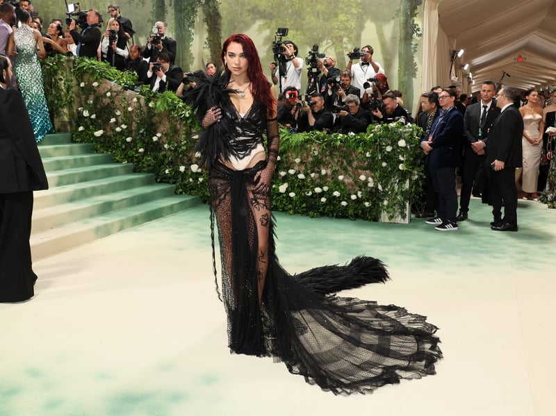Dua Lipa attends The 2024 Met Gala Celebrating "Sleeping Beauties: Reawakening Fashion".