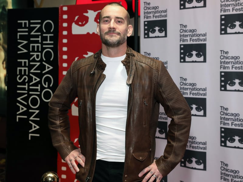 CM Punk - real name Phillip Jack Brooks - will be taking part in Netflix's live screening of WWE Raw and has a reported net worth of $12million.
