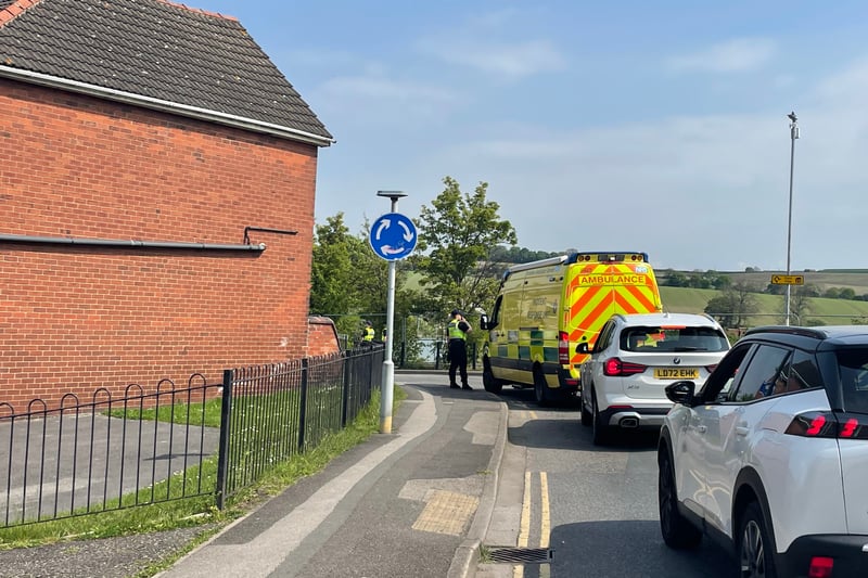 Incident response unit ambulance arriving at Brierley Road and being allowed through the cordon, at around 11:25am today (May 8).