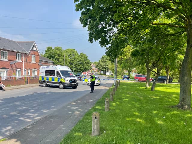 Police officers are turning cars away from the cordon on Brierley Road, Grimesthorpe.
