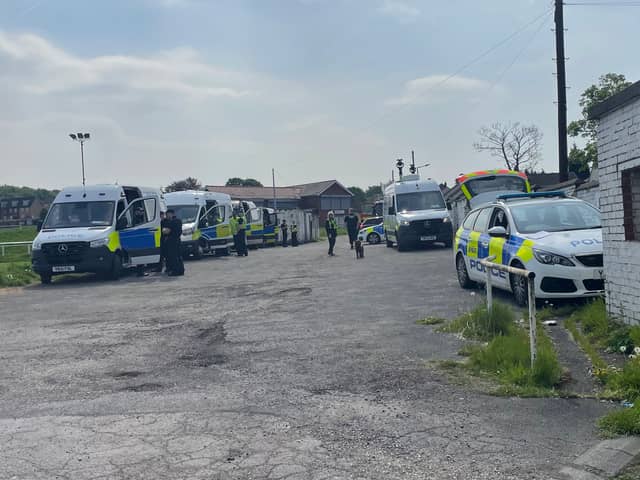 A police dog has also been pictured at the scene, amid at least six emergency vehicles which are parked at the Bruce Dyer Love Life Sports Ground, up the road from the address.