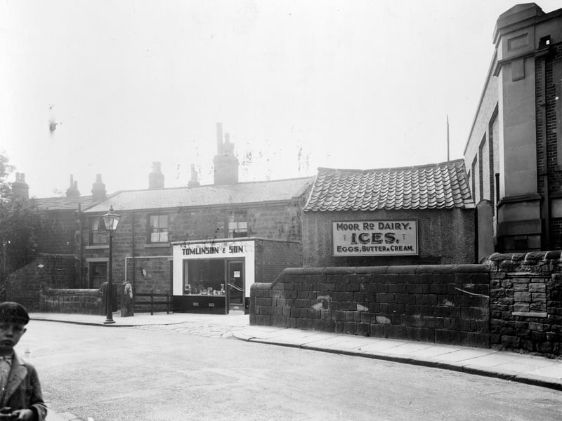 Moor Road Dairy pictured in August 1935. It dealt in butter, cream, milk, eggs and was locally famed for the home-made ice-cream which they sold. In this view a modern shop front has been added to the front of the house. The building on the right was an electricity sub-station built in the early 1930s. In the 1980s all the dairy property was converted to flats.