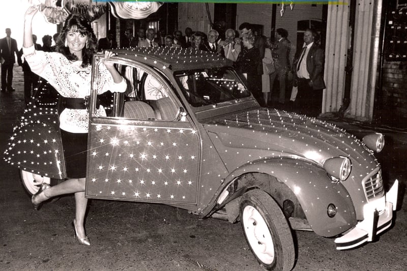 Queen of the Lights Eileen Durr in 1988 with the world's first Glimobile, a Citroen 2CV converted into a unique moving fibre optic light show, changing through the colours of the rainbow as it travels along the Promenade nightly through Blackpool Illuminations