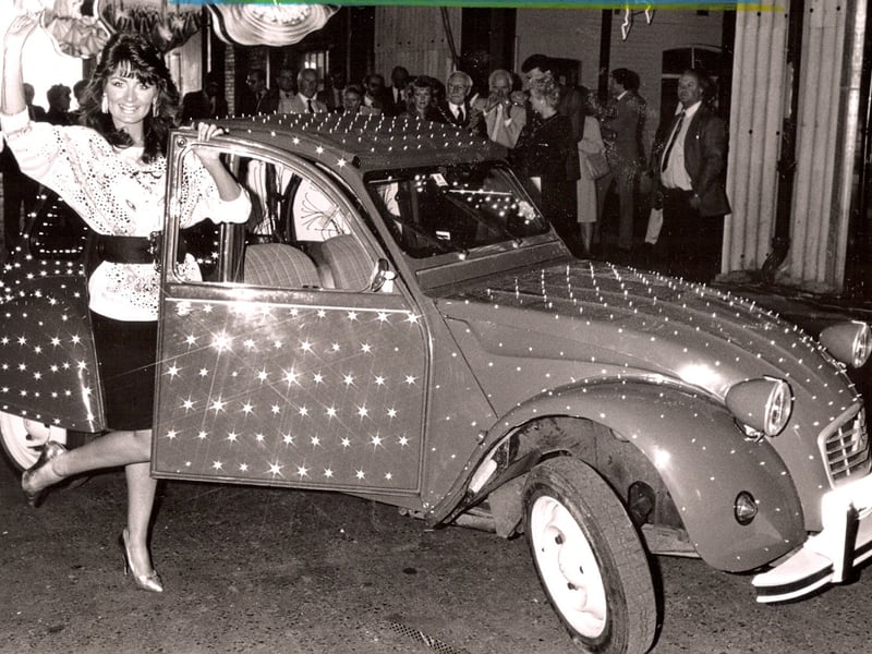 Queen of the Lights Eileen Durr in 1988 with the world's first Glimobile, a Citroen 2CV converted into a unique moving fibre optic light show, changing through the colours of the rainbow as it travels along the Promenade nightly through Blackpool Illuminations
