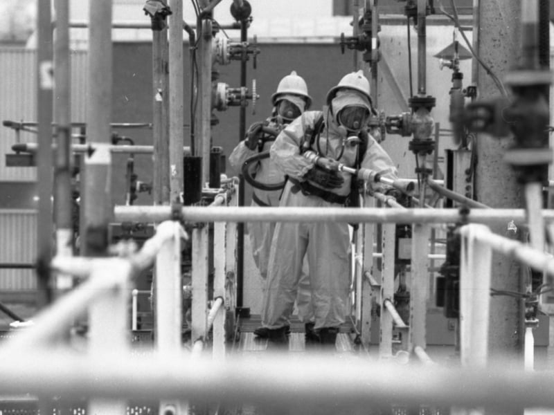 A major Lancashire nuclear plant was recovering from a full-scale alert when a dramatic toxic disaster incident was staged. A leak in a liquid storage tank caused emergency crews to rush to the scene with workers on stand-by for evacuation. But it was not for real - the assimilation of a deadly toxic leak at British Nuclear Fuels' Springfields site, Salwick, was performed as part of an annual exercise to test emergency procedures and worker repsonse. Firemen tackle the chemical 'leak'  