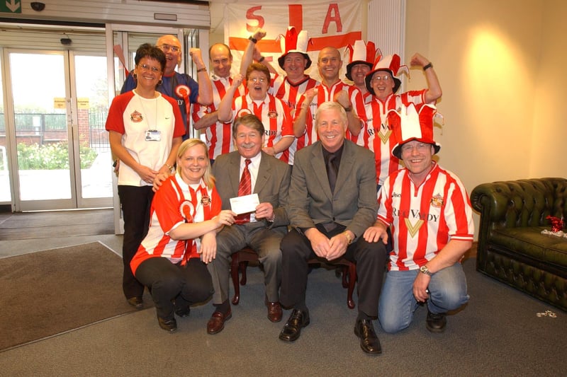 SAFC legends Bobby Kerr and Jimmy Montgomery were at the Littlewoods call centre in 2004 to receive a cheque for the Statue For Stokoe appeal.