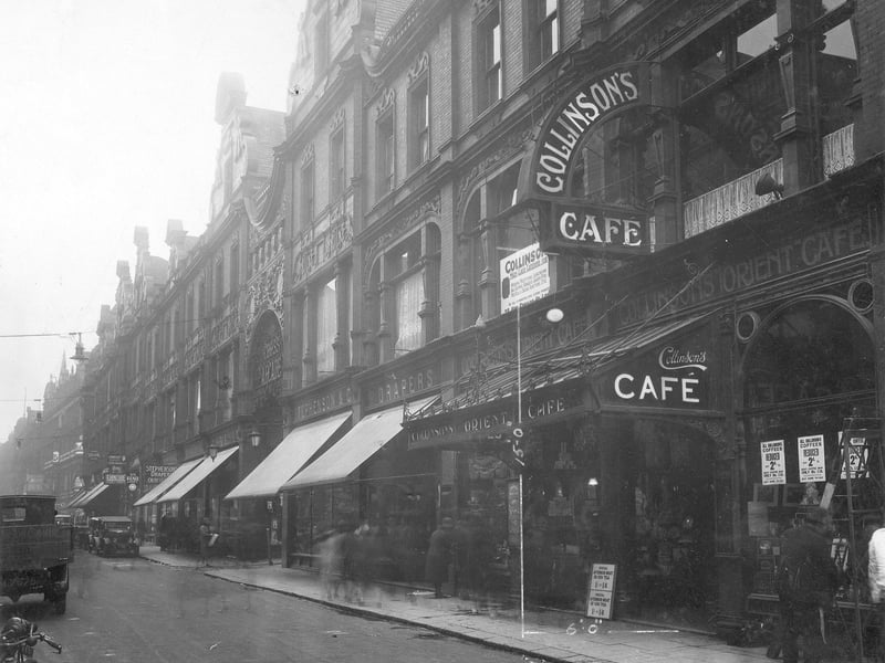 A view looking west along King Edward Street from Vicar Lane in May 1930. Collinson's Cafe, Stephenson's & Co drapers and Cross Arcade are shown in the background. S.N Kilner jewellers, Victoria furnishing & A.G Spalding athletic goods manufacturers are visible further along King Edward Street.