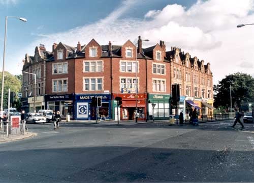 A parade of shops looking east from junction Headingley Lane. Woodhouse Street is on left with Woodhouse Lane centre and Hyde Park Road on the right. Pictured in October 1999.