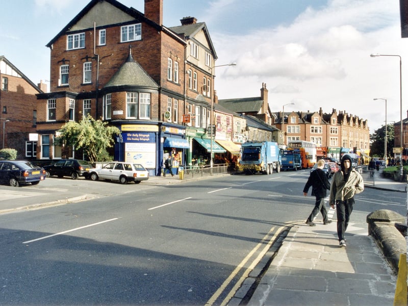 Shops on Headingley Lane looking in direction of Hyde Park Corner and junction with Woodhouse Street and Woodhouse lane. Junction with Regent Park Avenue is on the left with junction of Victoria Road on the right. Pictured in October 1999.
