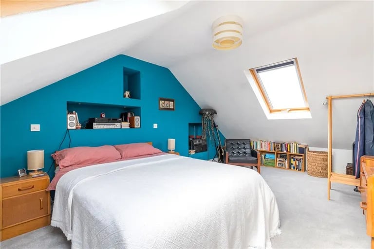 On the second floor is a further double bedroom with stylish skylights.