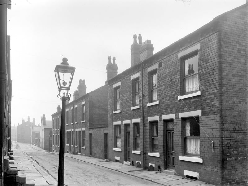 Haymount Street looking towards Lincoln Field Row in August 1958. The two main blocks of back to back terraced houses in this photo  are separated by a yard where the outside toilets are located. This was part of Newtown locality, now redeveloped as Lincoln Green.