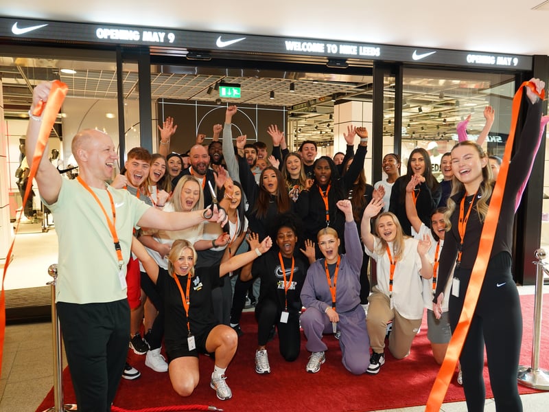 The Nike Rise team at the ribbon cutting of the new store at Trinity Leeds, including manager Christopher Young (L) and assistant manager Megan Freeborn