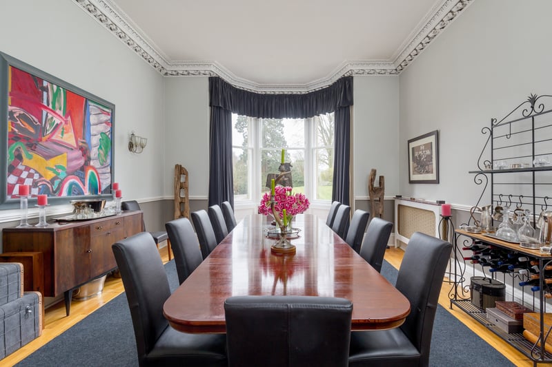 The dining room has plenty of space for hosting large families or entertaining.