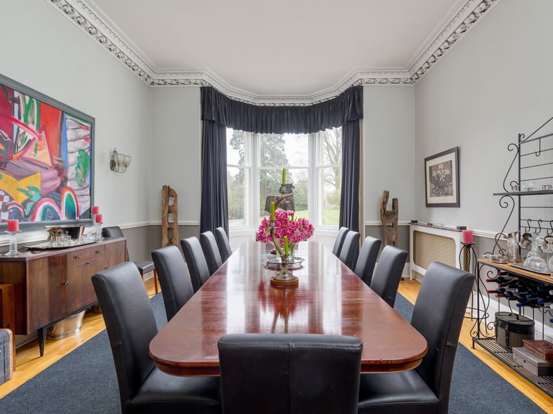 The dining room has plenty of space for hosting large families or entertaining.