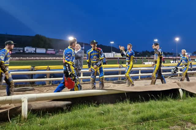 Tigers riders salute the crowd after their dramatic win over Belle Vue
