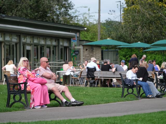 People enjoying the sunshine at Millhouses Park in Sheffield