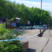 The cordon is currently in place around the Express Hand Car Wash on Archer Road, Millhouses, opposite the entrance to Sainsbury’s. Picture: Tim Hopkinson